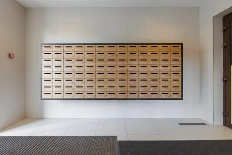Mailboxes in the lobby of an apartment building Stock Photos