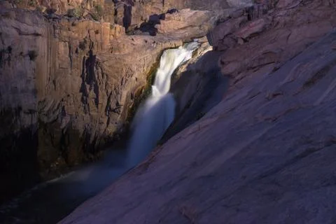 Main Augrabies waterfall after sunset, lighted by electric light Stock-Fotos