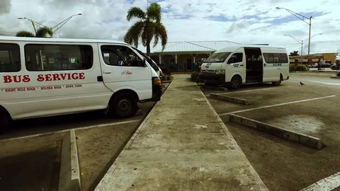 Main Bus Stop and Transit Hub in Downtown Freeport, Bahamas Stock Footage 98803176