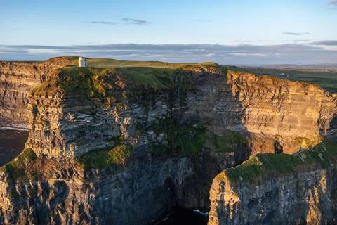 Main Cliff Face of Cliffs of Moher in Golden Hour Light Stock Photos