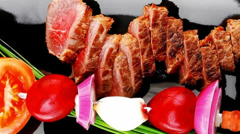 Main course : meat served on black plate 스톡 동영상 27097491