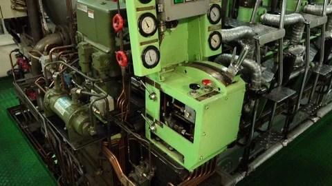 Main engine unit with control panel works in propulsion room Stock Footage 121119188