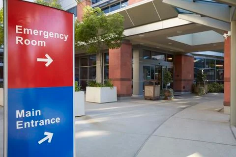 Main Entrance Of Modern Hospital Building With Signs Stock Photos