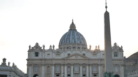 Main facade and dome of St. Peter's Basilica at sunset, seen from St. Peter's Stock Footage 166904716
