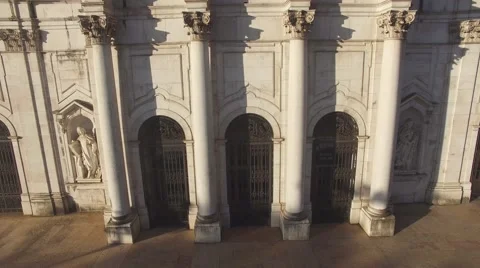 Main facade of the Estrela Basilica in Lisbon at morning aerial view Stock Footage 63908097