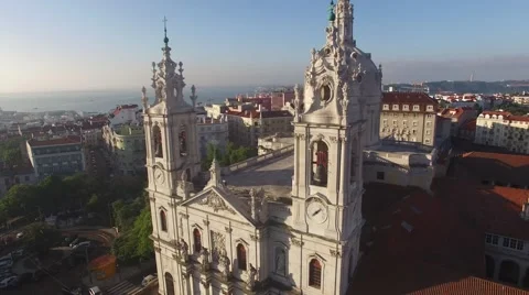 Main facade of the Estrela Basilica in Lisbon at morning aerial view Stock Footage 63915158