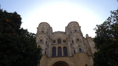 Main facade of Malaga Cathedral pan shooting. Stock Footage 103357688