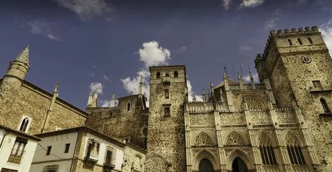 Main facade of the Mudejar Gothic Monastery of Guadalupe. Stock Photos