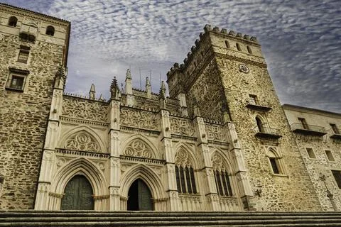 Main facade of the Mudejar Gothic Monastery of Guadalupe. Stock Photos
