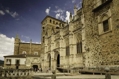 Main facade of the Mudejar Gothic Monastery of Guadalupe in Spain. Stock Photos