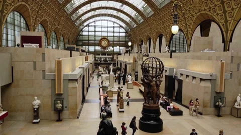 Main gallery in the Orsay museum in Paris with visitors and multiple art Stock Footage 161945281