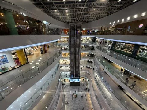 Main hall of the Mall, elevator, boutiques shops. Tirana, Albania Stock Photos