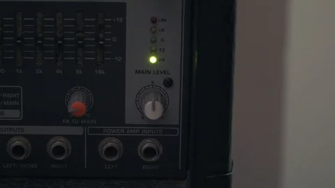 Main level with sound gain light show on analog mixer, main level knob on Stock Footage 87910931