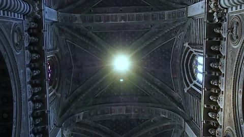 Main nave and rose window of the Duomo of Siena in 4k Stock Footage 101530204
