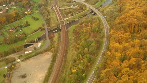 Main road with driveway and exit to next road in autumn Stock Footage 118278174