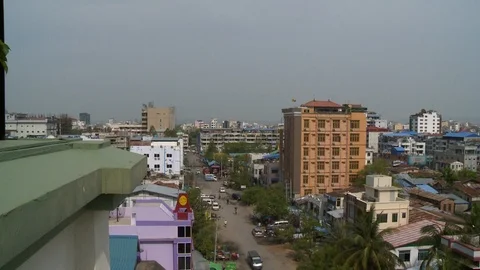 A main road separating buildings in a city Stock Footage 112687607
