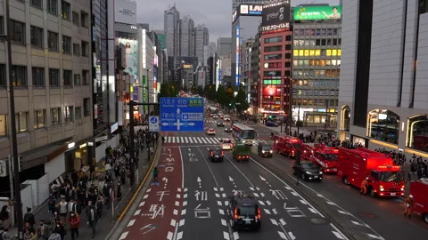 Main road in Shinjuku in early evening. Tokyo, Japan. Stock Footage 249661853