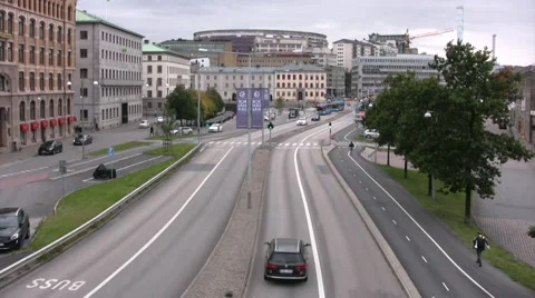 Main road viewed from pedestrian bridge in central Gothenburg Stock Footage 55692644