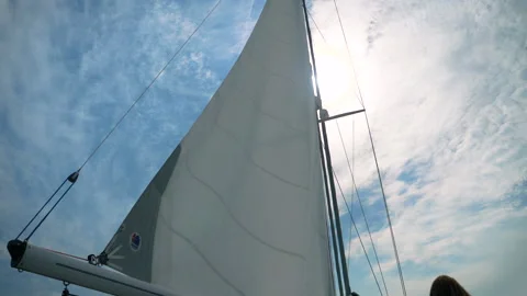 Main sail breezing in the wind on a sunny day. Stock Footage 137456682