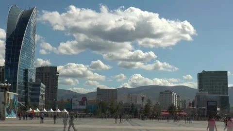 The main square of Mongolia in Ulaanbaatar, on a sunny summer day, timelapse. Stock Footage 302759224