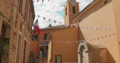 Main square in Sainte-Agnes with charming downtown atmosphere, South of France Stock Footage 345546175