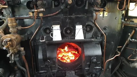 Main steam train engine fire box on footplate  5 Stock Footage 159911171