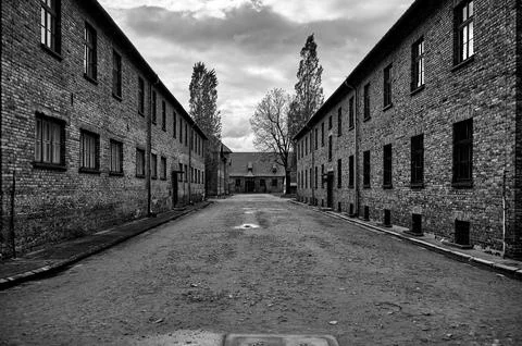Main street between brick barracks at Auschwitz camp Stock Photos