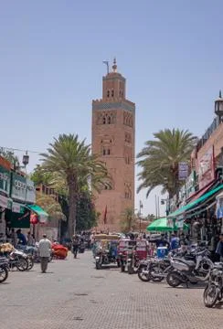 Main street in front of the Marrakech mosque Stock Photos