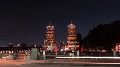 Main view of the Dragon and Tiger Pagodas at lotus pond. 4K night time lapse Stock Footage 118874005