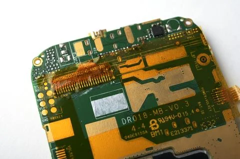 Mainboard circuit inside of mobile phone , Technology concept. Stock Photos