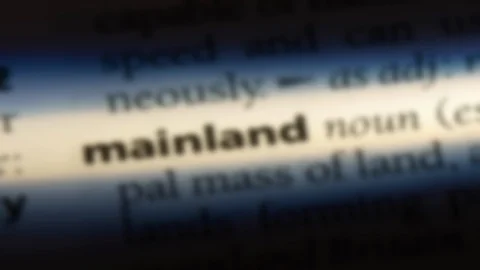 Mainland word in a dictionary. Stock Footage 99563249