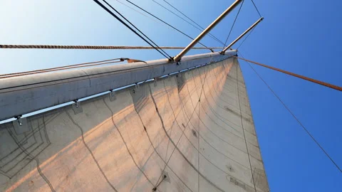 A mainsail is filled with a light breeze Stock Footage 139133583