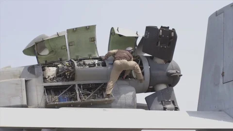 Maintainer working on aircraft aboard USS Boxer Stock Footage 114001410