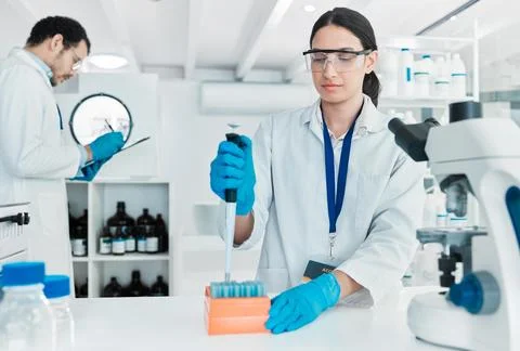 Maintaining an objective and standardised approach to experiments. a young Stock Photos