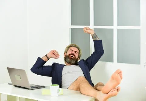 Maintaining regular business hours. Work through evening or procrastinate Stock Photos
