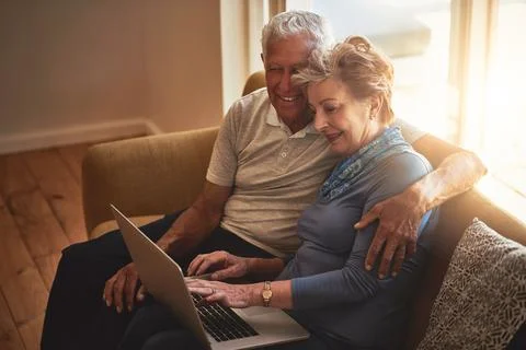 Maintaining their independence with modern technology. a happy senior couple Stock Photos