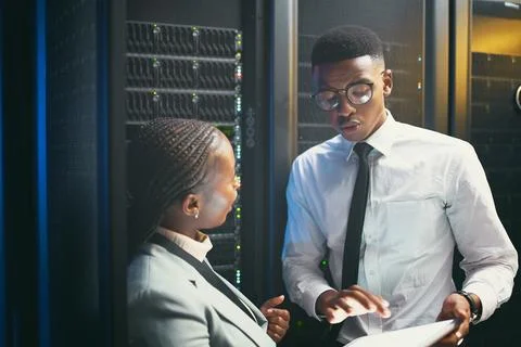 Maintenance, analysis or team in server room with tablet, network or system Stock Photos