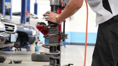 Maintenance car shock absorber Stock Footage 71012976