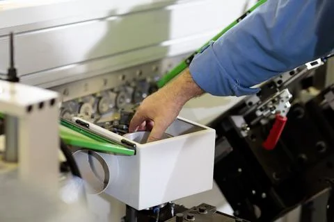 Maintenance of chipboard or MDF processing machine Stock Photos