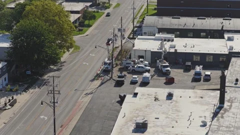 Maintenance construction crew repairing power grid bringing electricity online Stock Footage 343659252