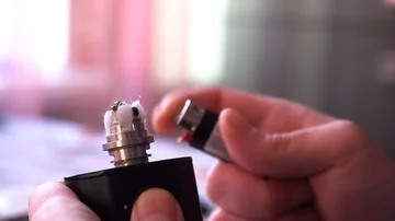 Maintenance of electronic fur modem. Master of repair of the evaporator.man sets Stock Footage 85993841