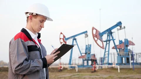 Maintenance Engineer. Checking the oil pump Stock Footage 140750865