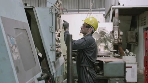 Maintenance engineer control automatic and pressing machine with panel in fac Stock Footage 139631897