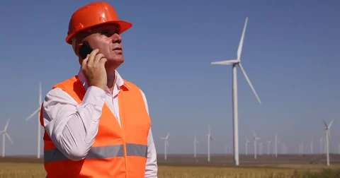 Maintenance Engineer Mobile Talk Wind Turbines Farm Plant Energy Industry Stock Footage 83654154