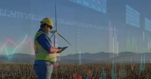 Maintenance engineer raising tablet tapping screen monitoring translucent wind Video stock 314742549