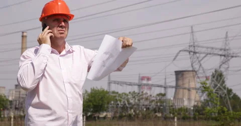 Maintenance Engineer Teamwork Cell Phone Coordination Blueprint Service Scheme 스톡 동영상 57631541