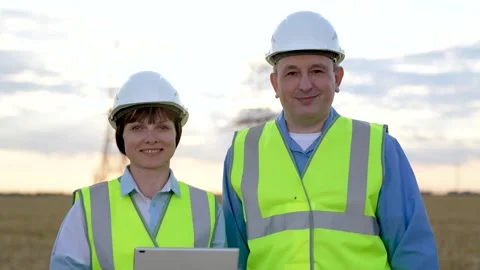 Maintenance with helmet laptop. Work brings satisfaction.Engineer smile face - Video stock 247397983