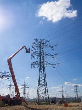 Maintenance of high voltage lines Stock Photos
