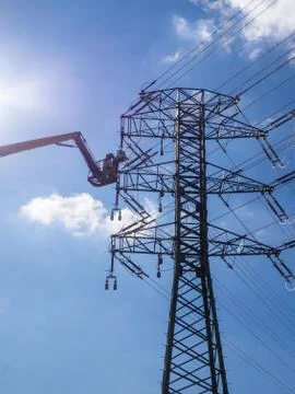 Maintenance of high voltage lines Stock Photos