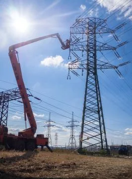 Maintenance of high voltage lines Stock Photos